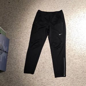 Men’s Black Nike Sweatpants; Zipper at bottom